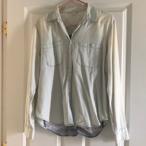 A blue button up flannel style shirt